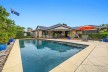 SPACIOUS FAMILY HOME IN PELICAN WATERS